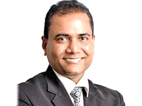 Dr. Premasiri Gamage